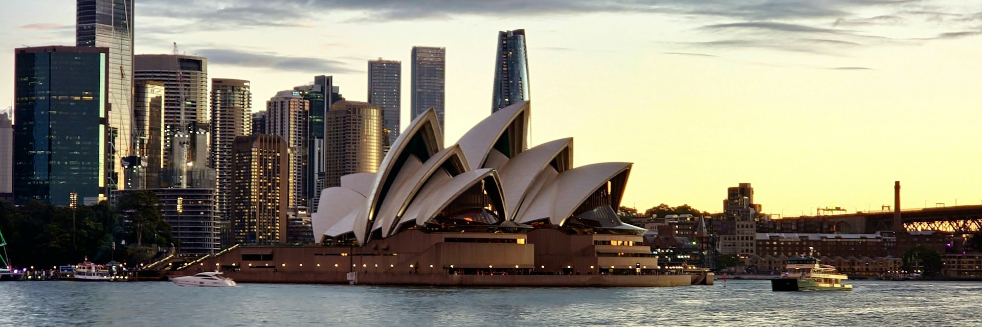 Sydney Harbour skyline with the Opera House at dusk